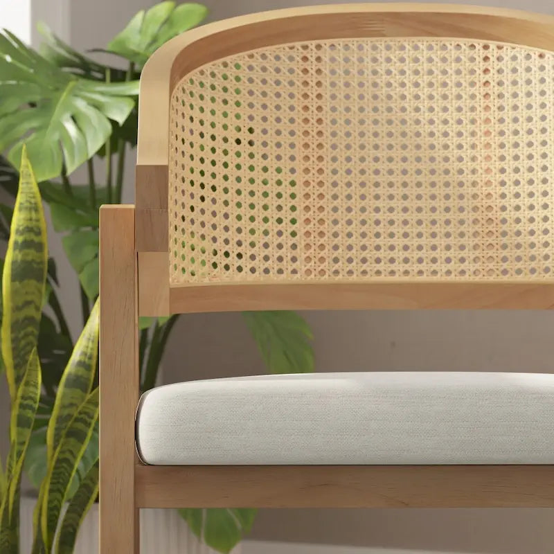 Silla de comedor con respaldo tejido de ratán y asiento tapizado